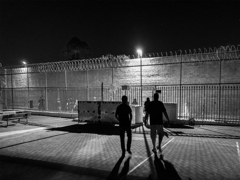 Black and white photo of prison exercise yard
