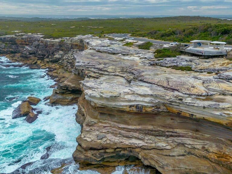 Aerial photo of the whale watching platform at Cape Solander with views beyond to Royal National